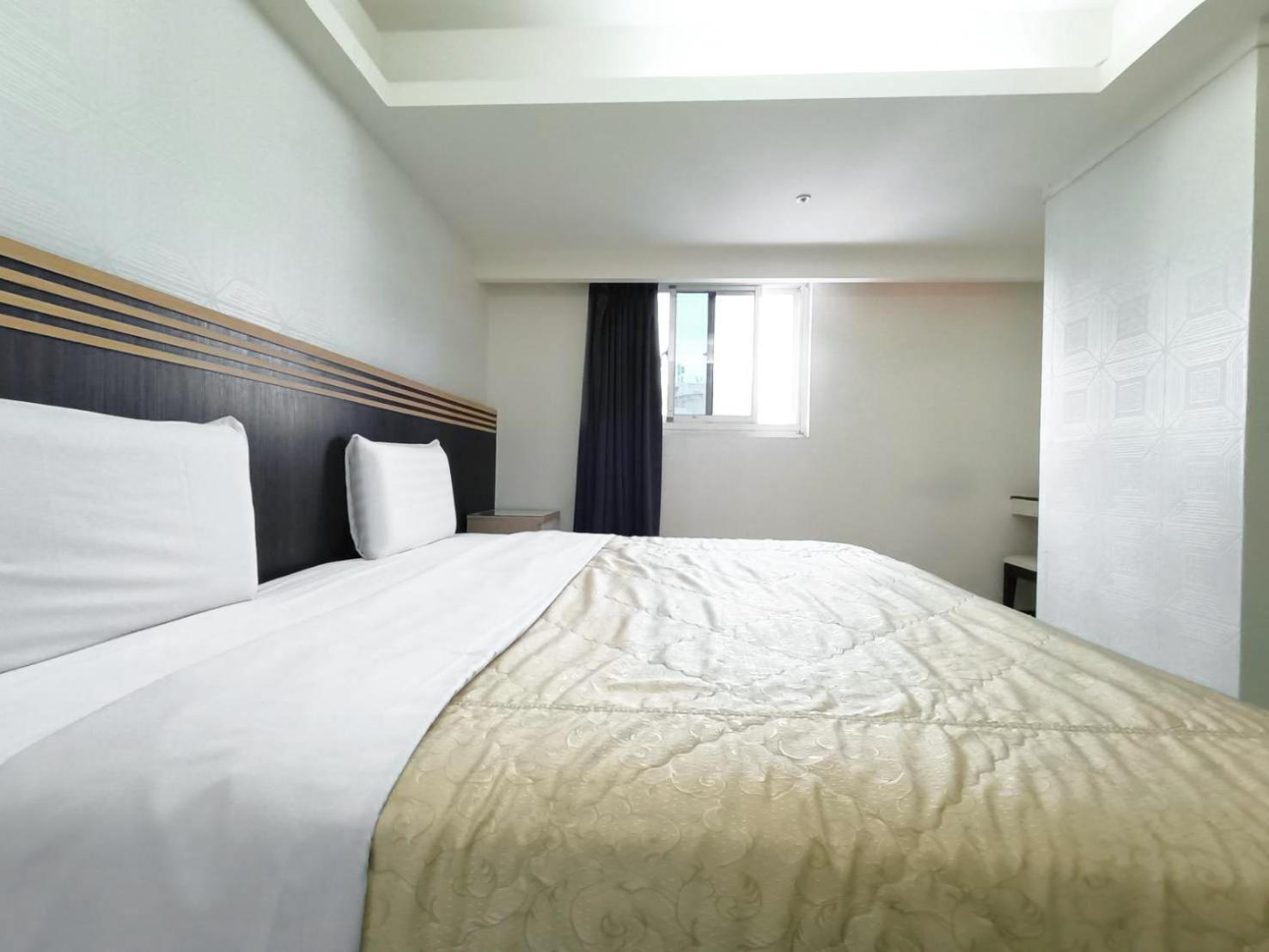 Guide Hotel Taoyuan Fuxing Habitación foto